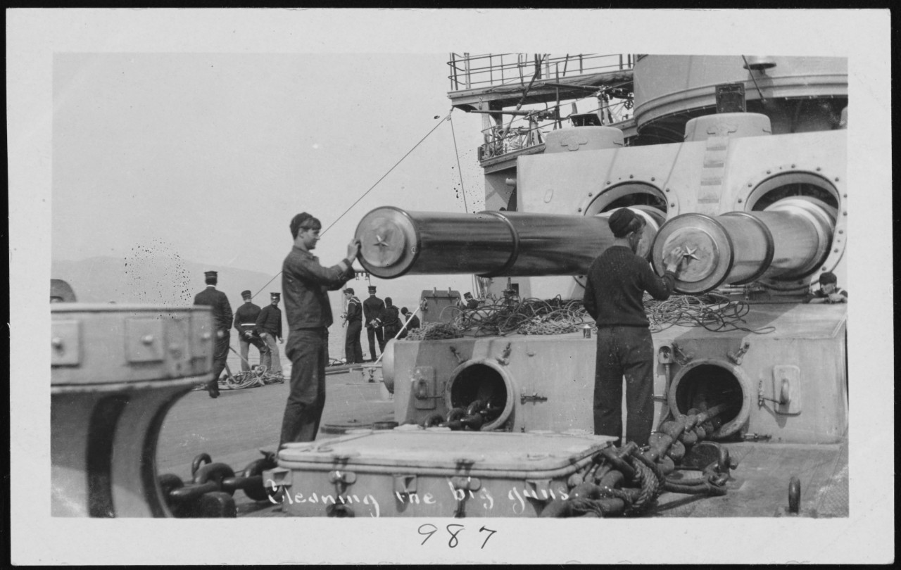 Photo #: NH 106065  &quot;Cleaning the big guns&quot;