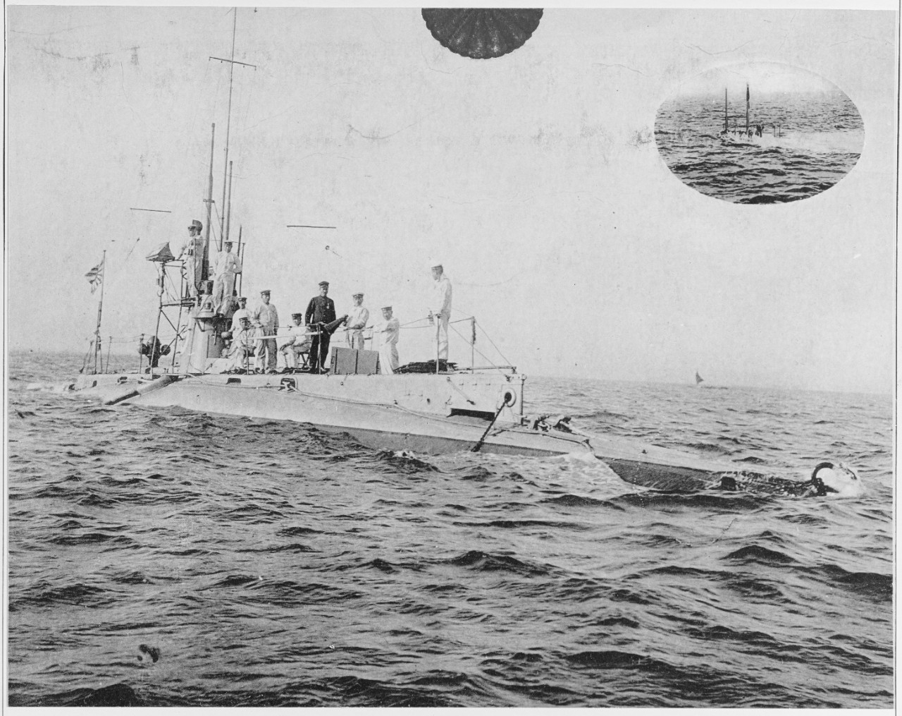 Men stand on Japanese Submarine, and Submarine No. 29
