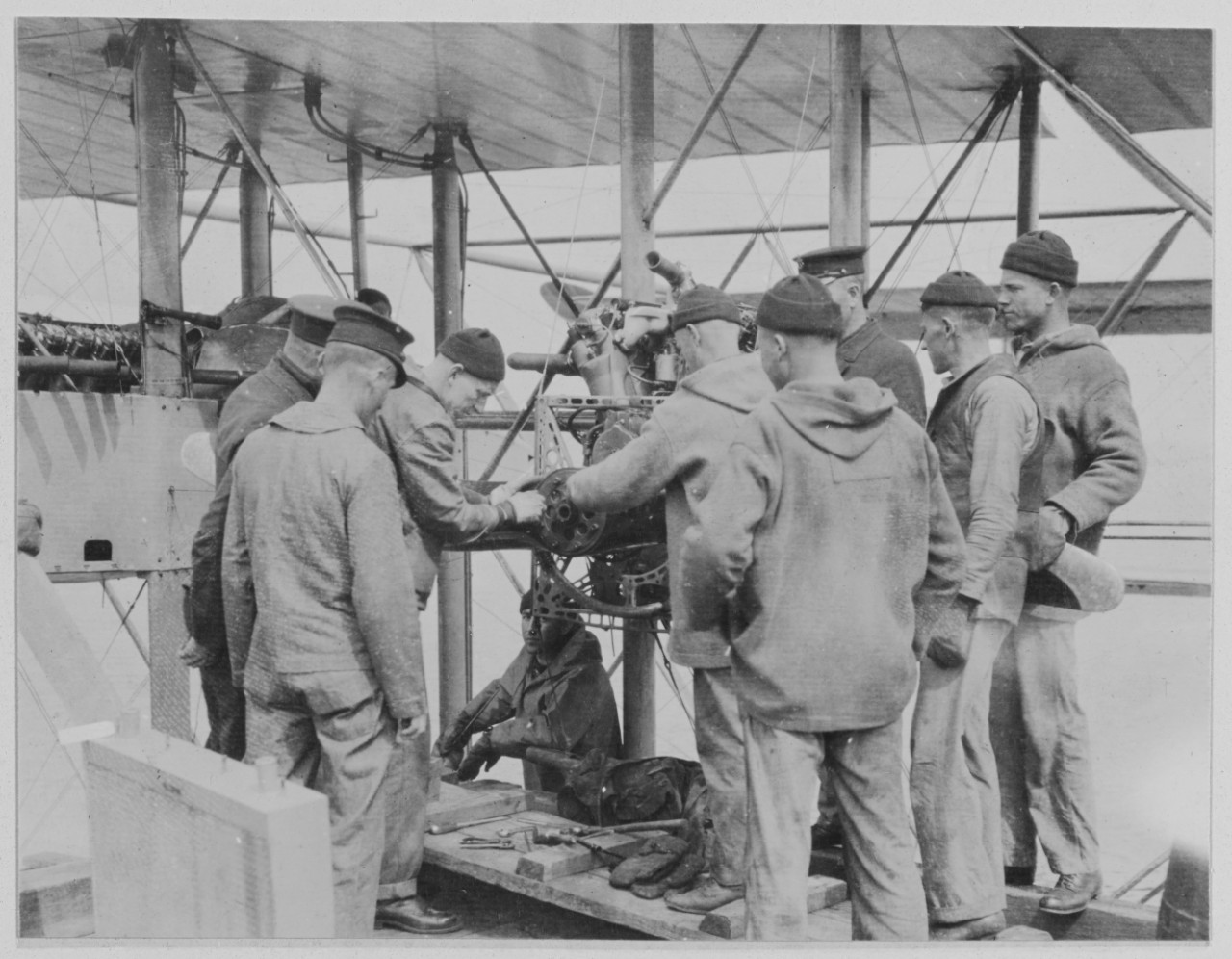 Mechanics at work on engine of seaplane NC-1 Rockaway, New York