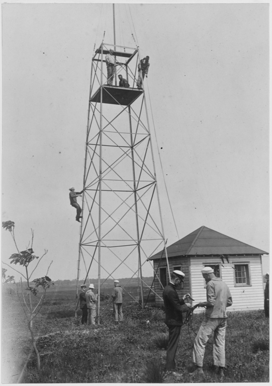 Men constructing wireless telephone and telegraph station at Roosevelt Field, Mineola, Long Island, New York