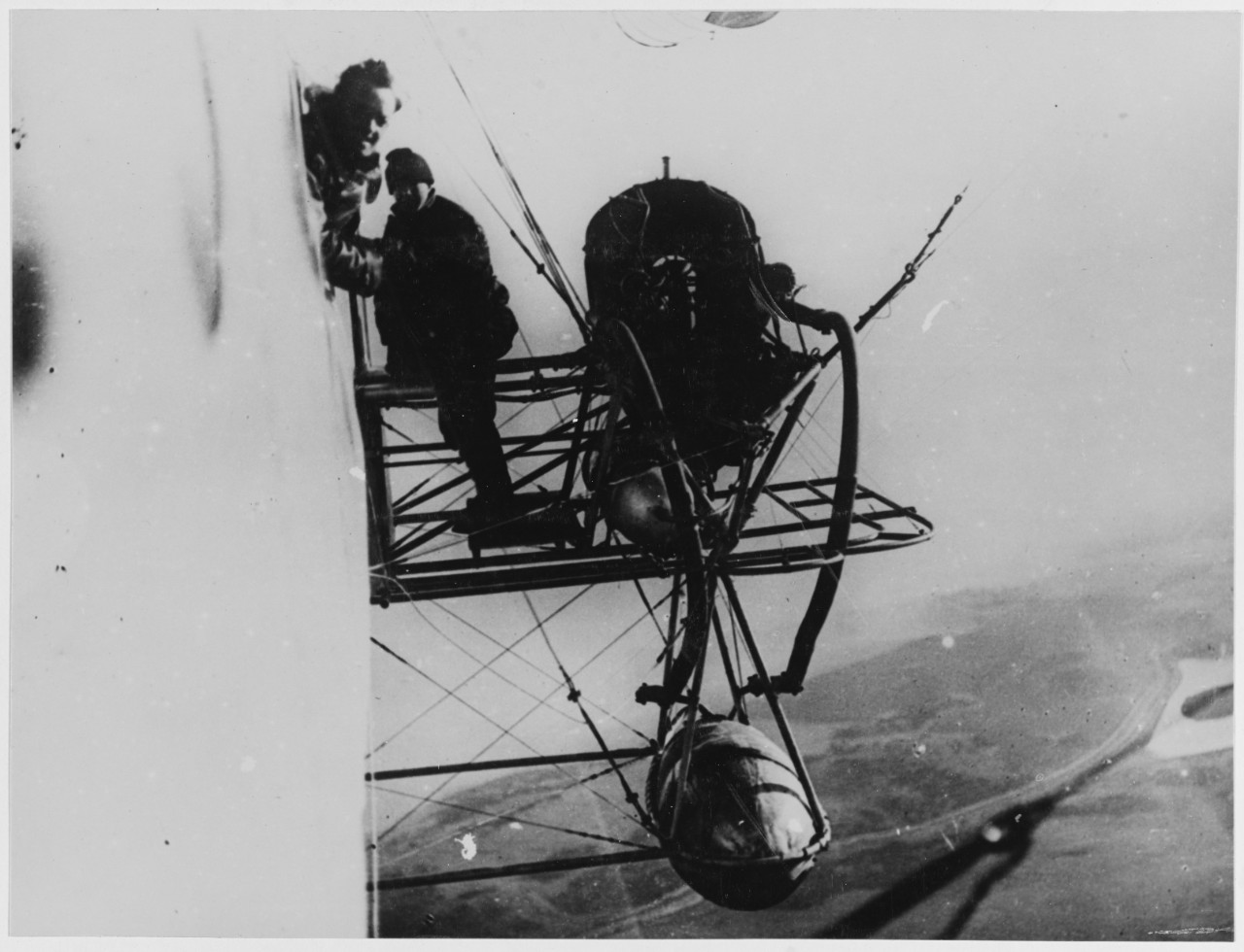 Men looking out of British Dirigible. Setting out in patrol