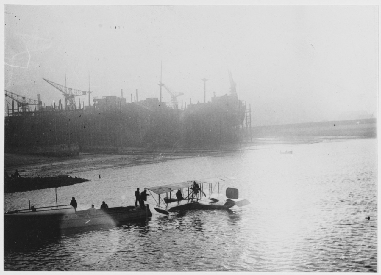 French seaplane in the water, being towed in after a flight, Dunkirk, France