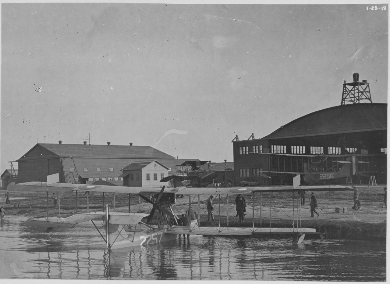 Beach and hangars, plane in the water. U.S. Naval Air Station, Cape May, New Jersey,  January 25, 1919
