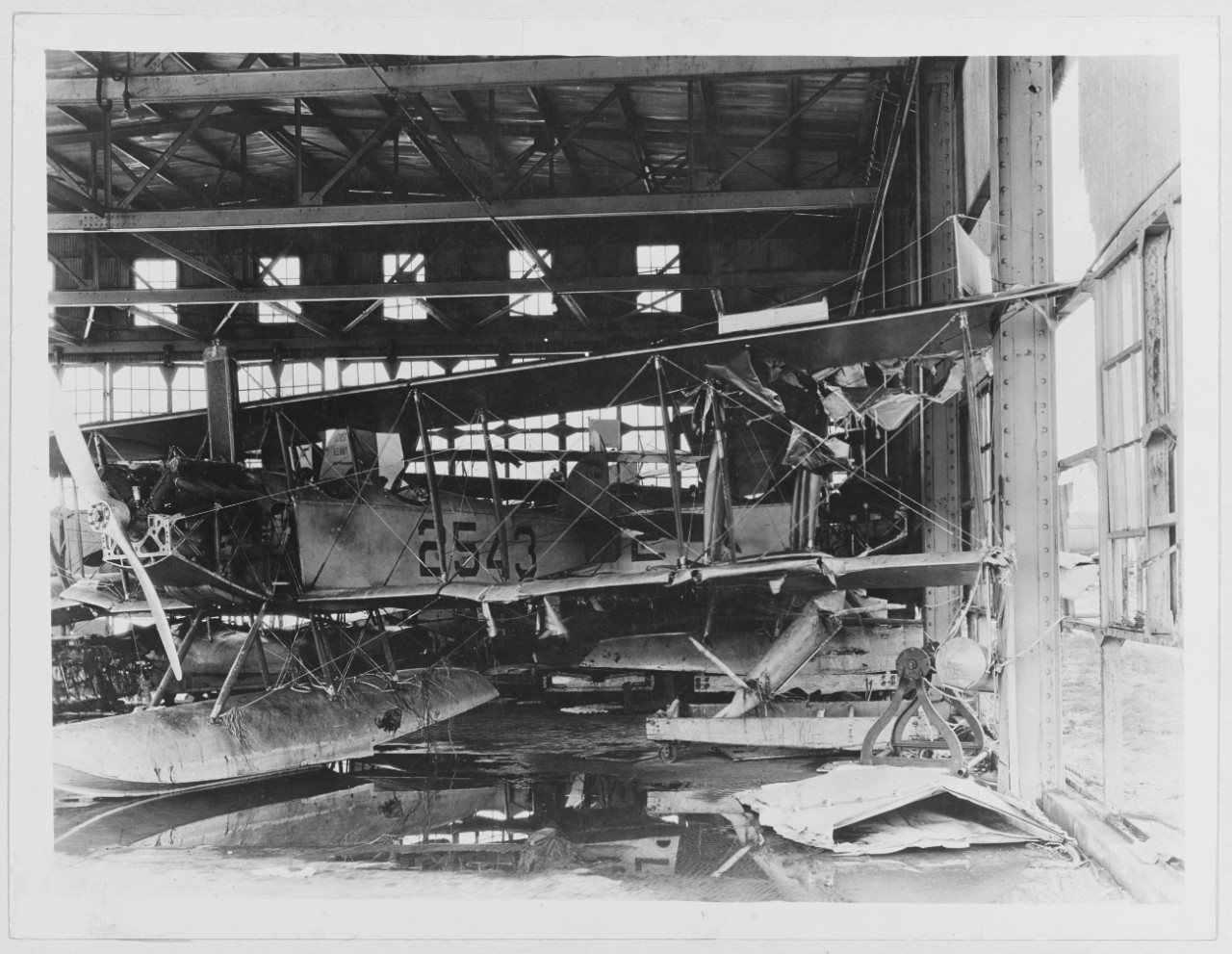 Storm damaged N-9 seaplanes in hangar, Pensacola