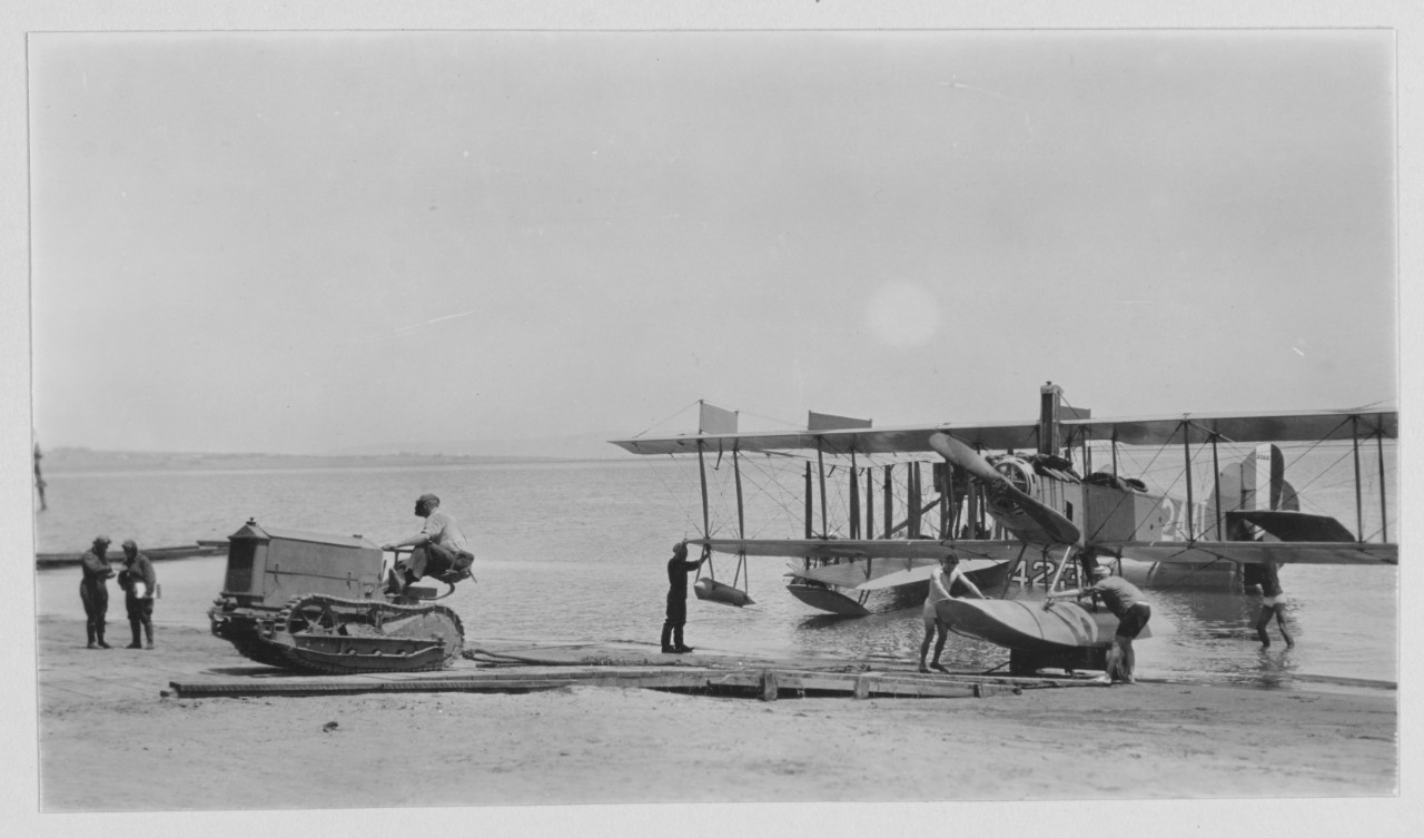 Tractor towing seaplane ashore