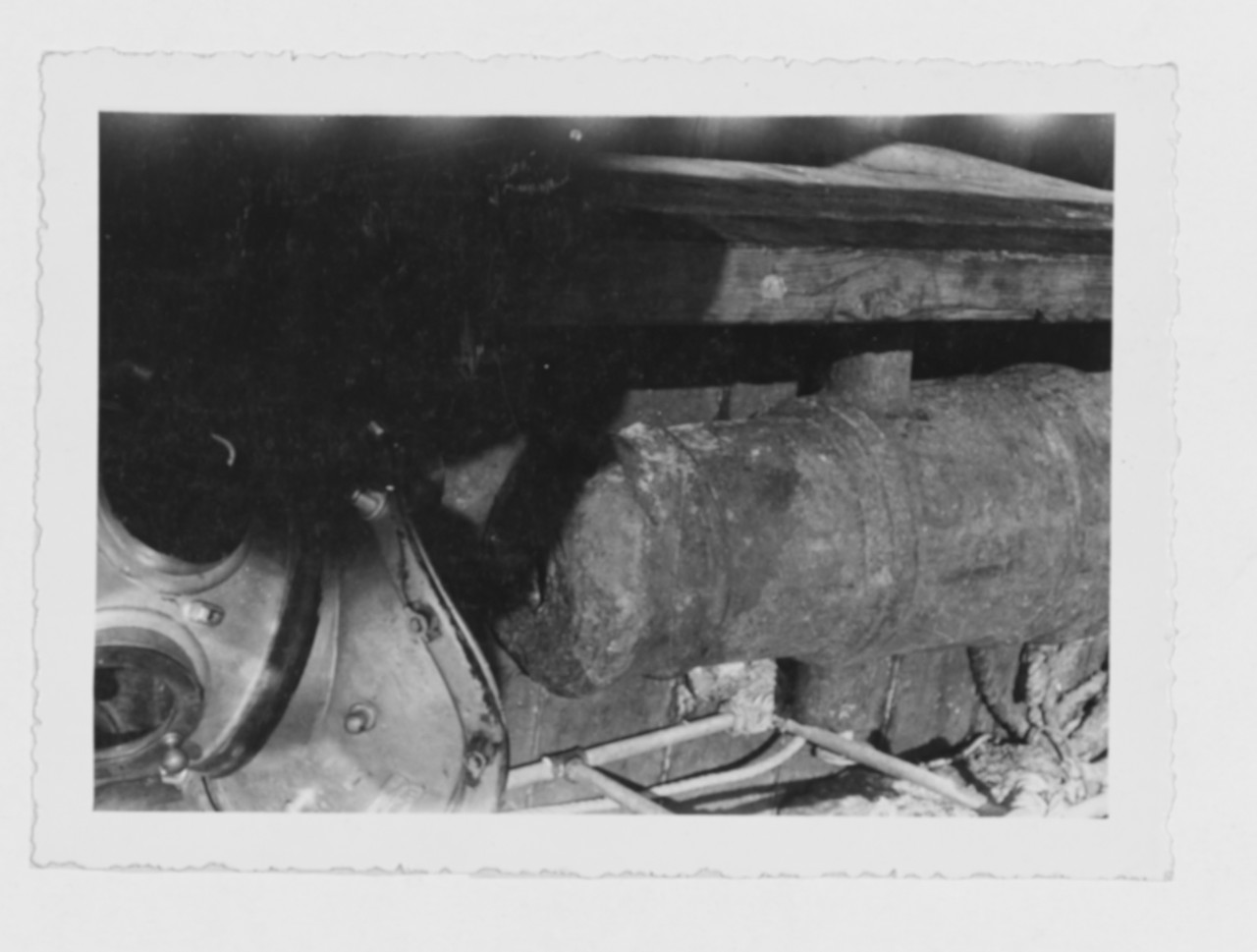 Salvaged Gun and Diving Helmet During Salvage Mission South of Cuba