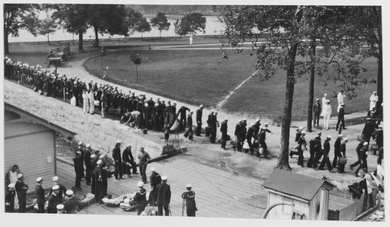Unloading patients at Norfolk.  U.S. Naval Hospital, Norfolk, Virginia. Circa 1919
