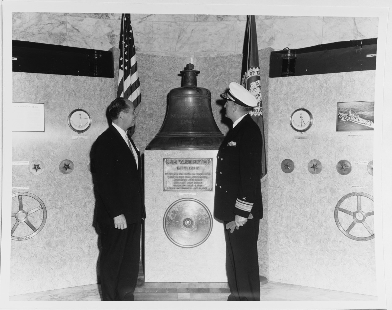Rear Admiral Towner and Governor Rosseleni looking at Memorial of Battleship USS WASHINGTON (BB-56)