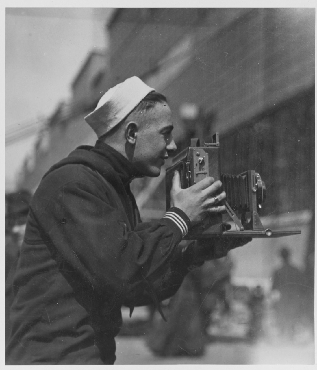 Navy Photographer Taking a Picture