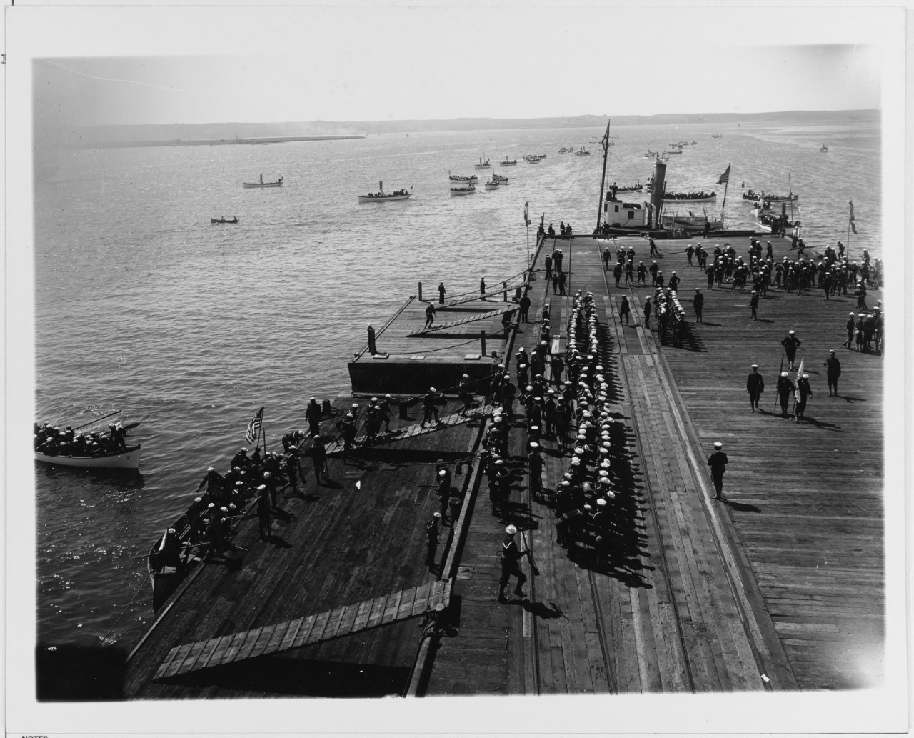 Sailors landing at wharf from Admiral Evans Fleet