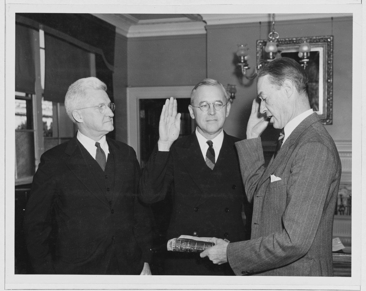 Left to right; Admiral Harold R. Stock, U.S.N., Rear Admiral Van Keuren (ee) USN, Rear Admiral Walter B. Woodrow, U.S.N., Rear Admiral Alexander Hamilton Van Keuren, (ee), U.S.N. taking oath of office as Chief of Bureau of construction and repair.