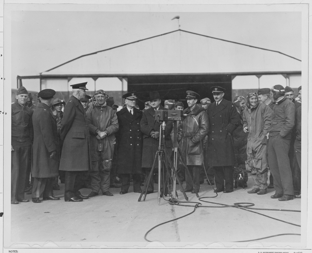 Left to right; Fuller B. H. Major General, USMC.,  Mulcahy, E.P. Capt., USMC., Moffett, W.A, Rear Admiral USN., charge d'affairs from Nicaraguan to U.S., Childs, W.G., Comdr., Comdt. Anacostia, D.C, Mueller, Louis E., Lt. Comdr., (MC).