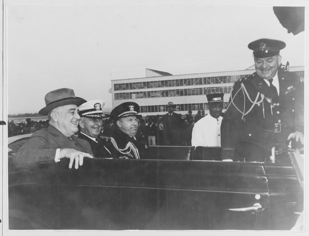 Left to right: F.D. Roosevelt, Capt. C. P. Mason, Rear Admiral Ross T. Mcintyre Brig. Gen. Watson