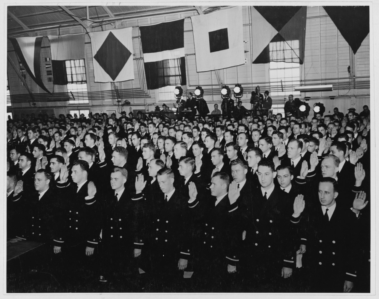 441 Midshipmen become ensigns.
