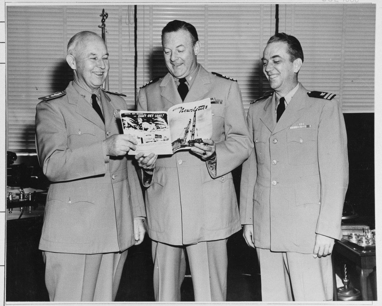 L to R: Rear Admiral M.L. Royar, Capt. Chesney, Lt. J. Maxwell