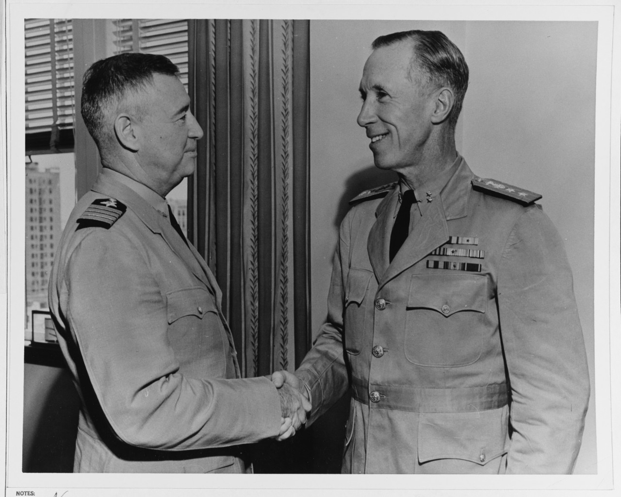 Rear Admiral Walter S. Anderson with Capt. H. H. J. Benson.