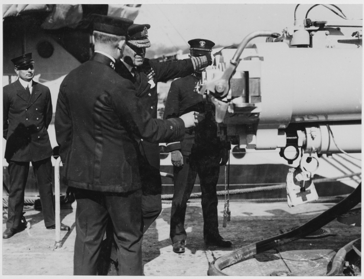 First Sea Lord Admiral Sir Rosslyn Wemyss inspecting newest type of American destroyer gun