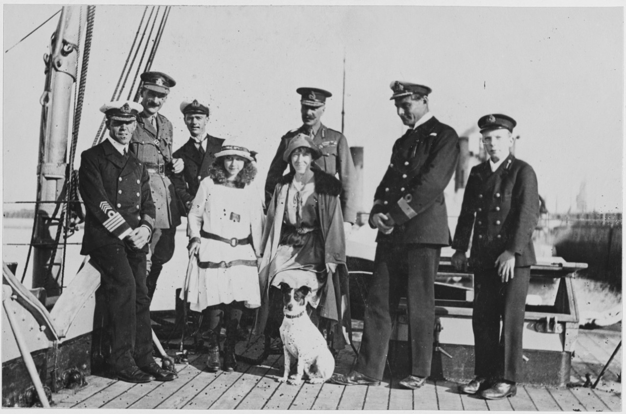 Belgian Queen and children pose on ship deck with men in uniform