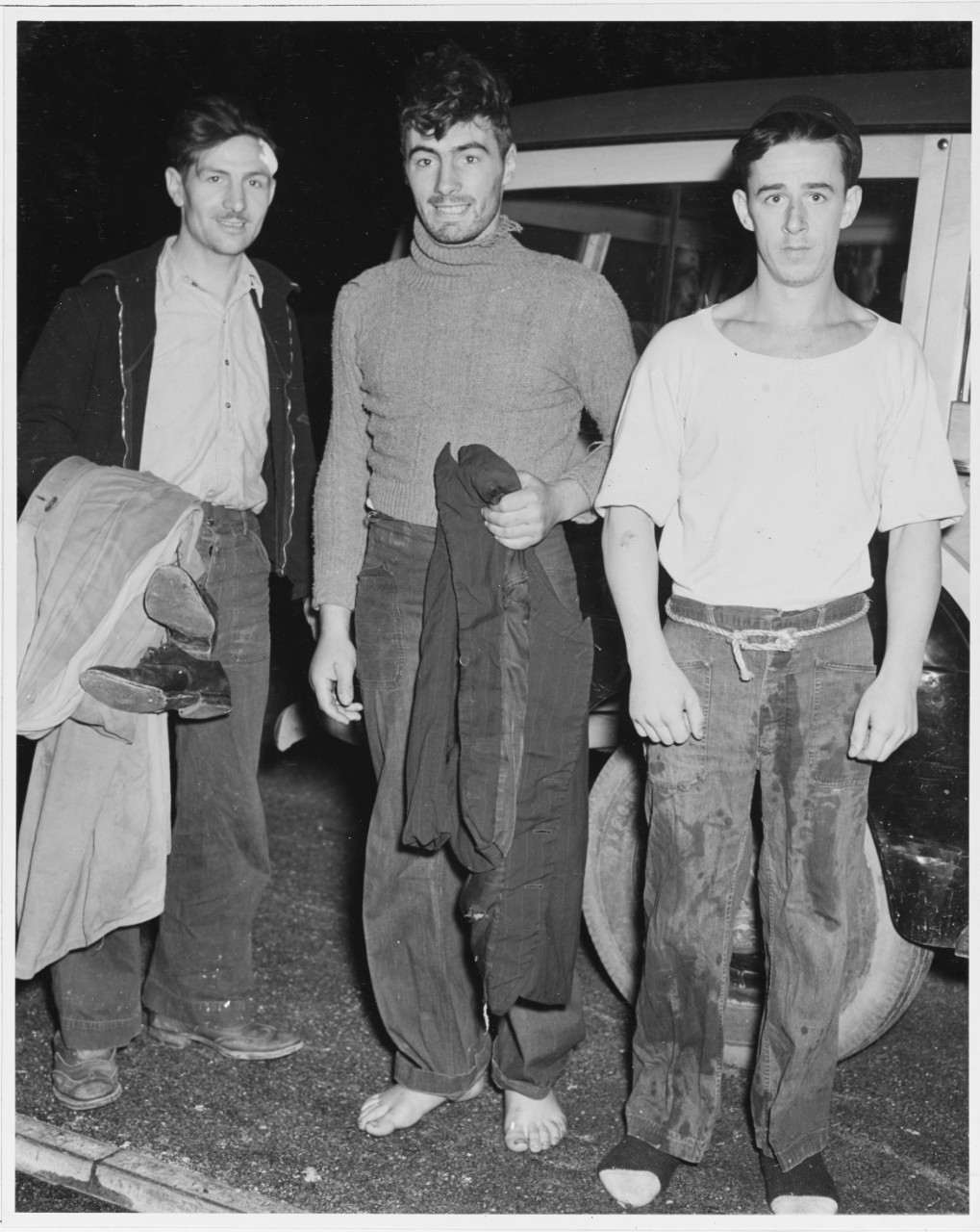 Survivors of SS "OCEAN VENTURE" being brought ashore at Norfolk, Virginia