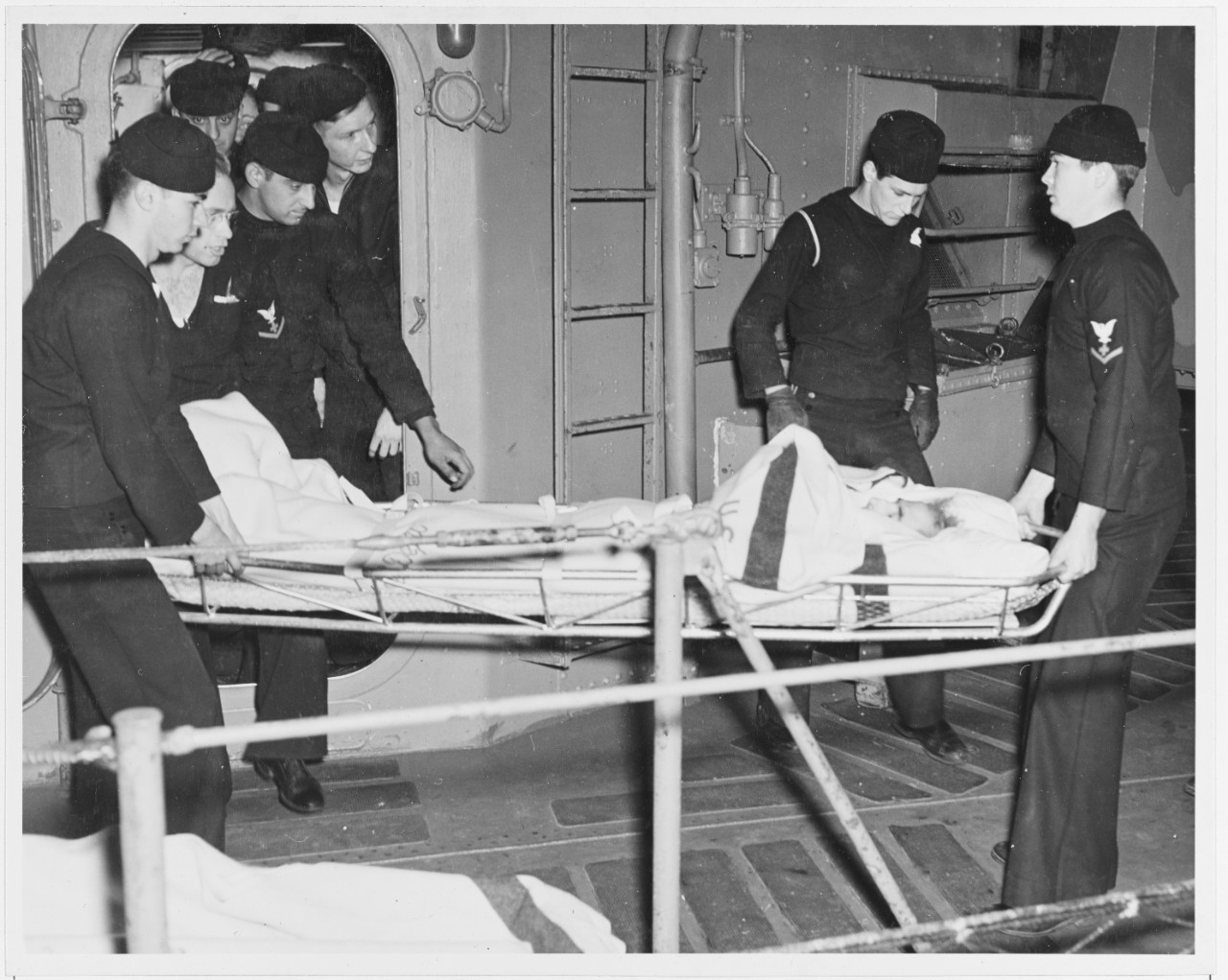 Survivors of SS "OCEAN VENTURE" being brought ashore at Norfolk, Virginia