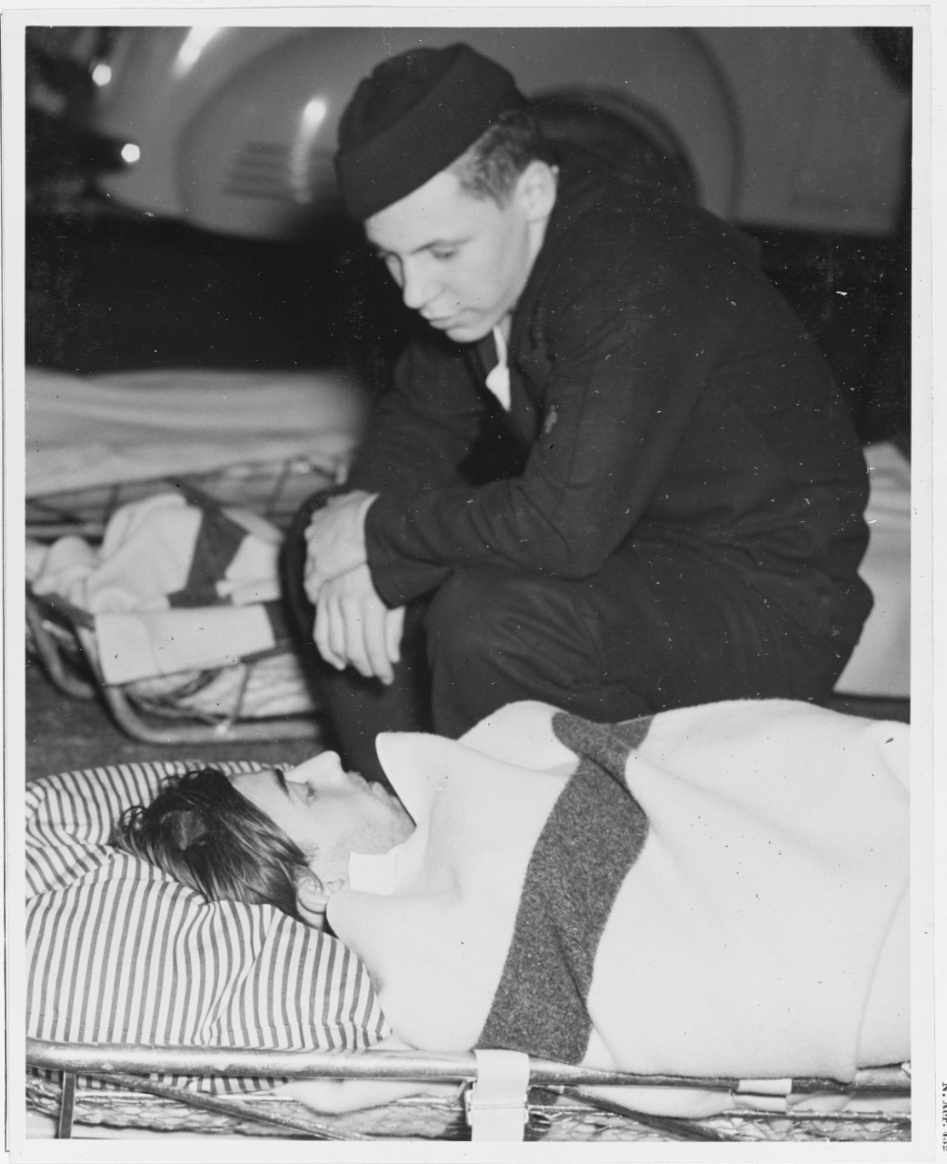 Survivors of SS "OCEAN VENTURE" being brought ashore at Norfolk, Virginia