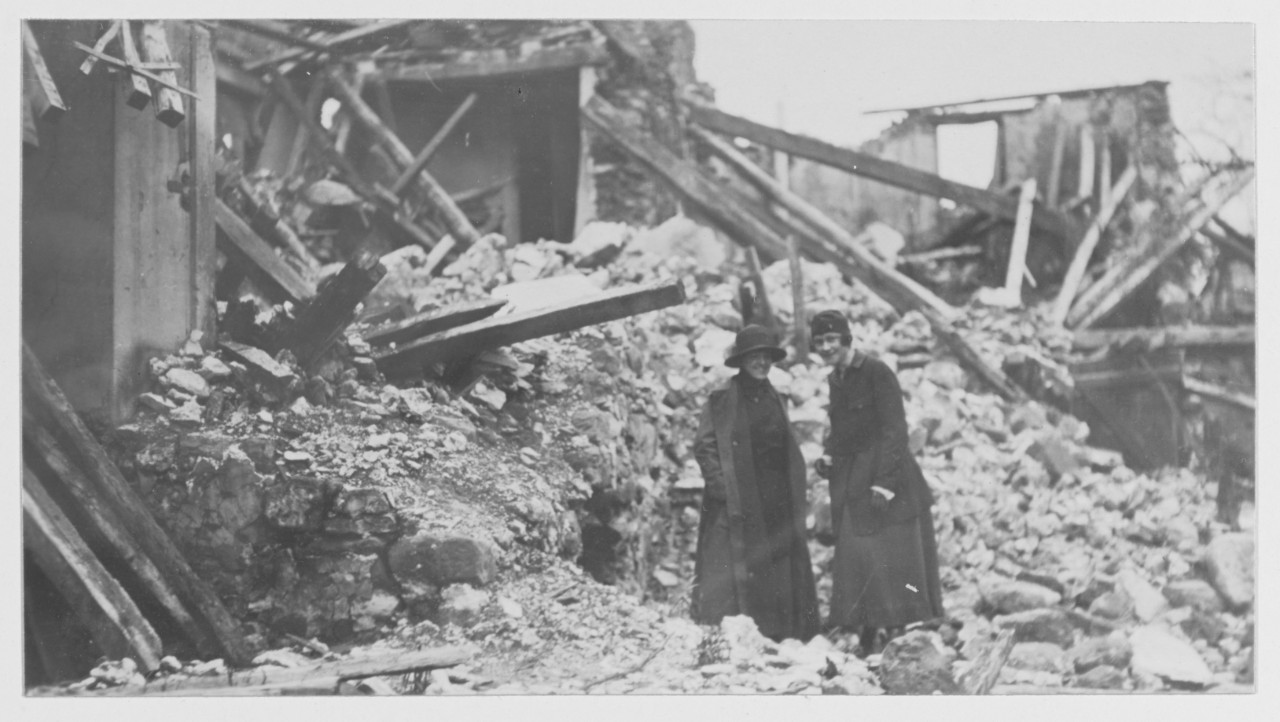 Two women stand in the ruins at Chateau Theirry, France