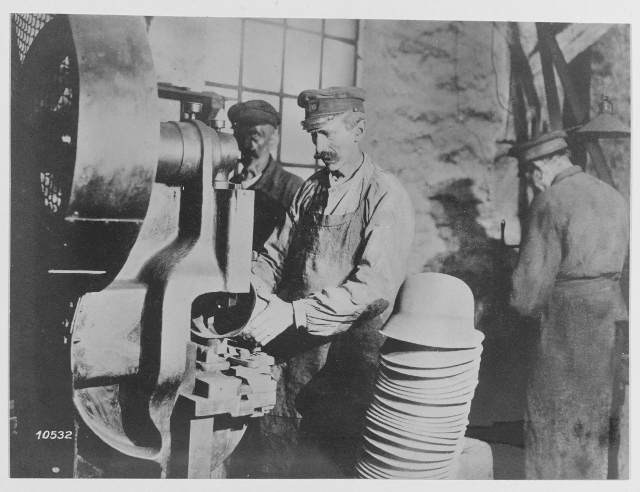 The manufacture of steel helmets at Lubeck.