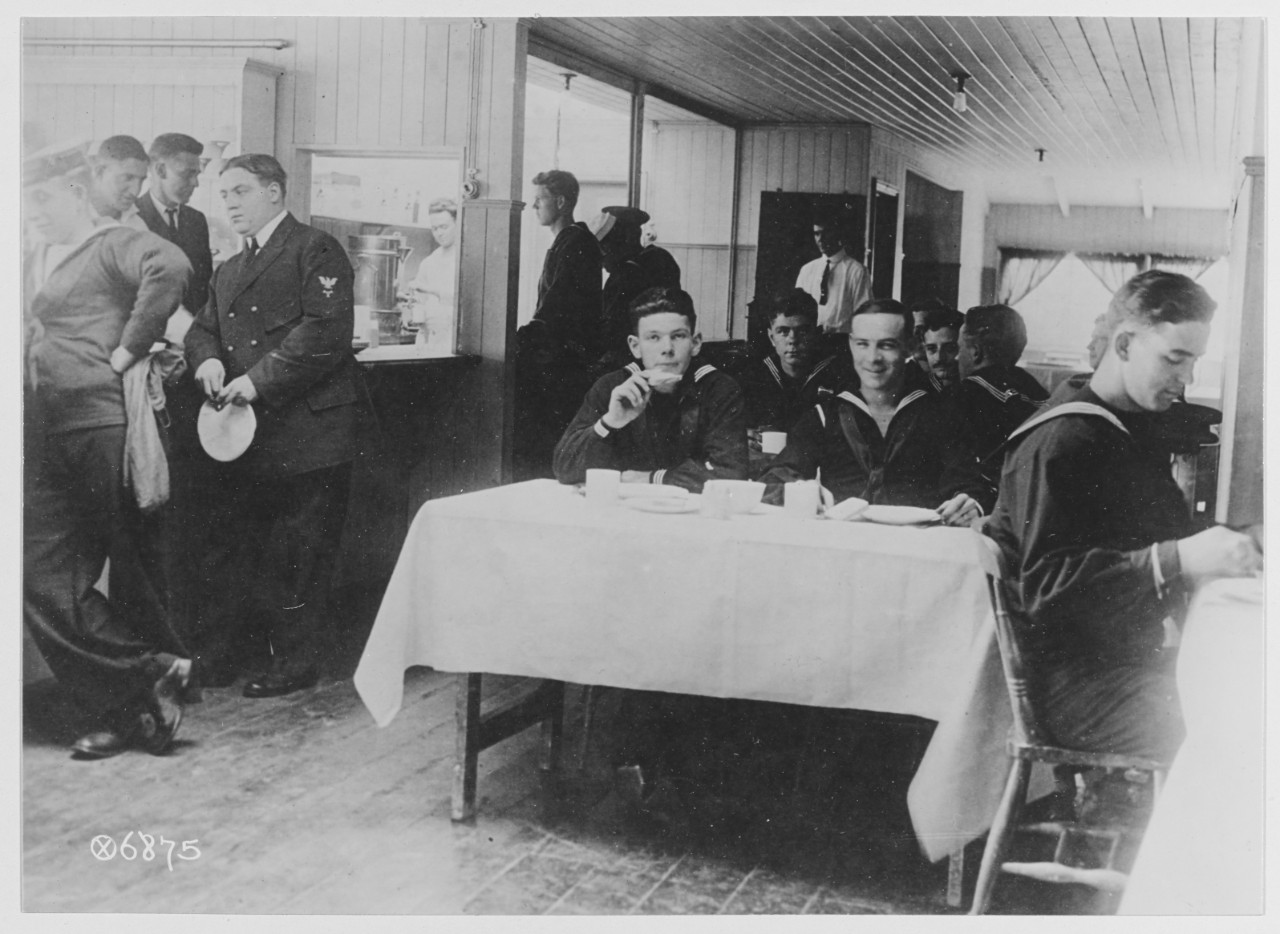 With the American Navy in wartime. The restaurant in the Naval men 's club.