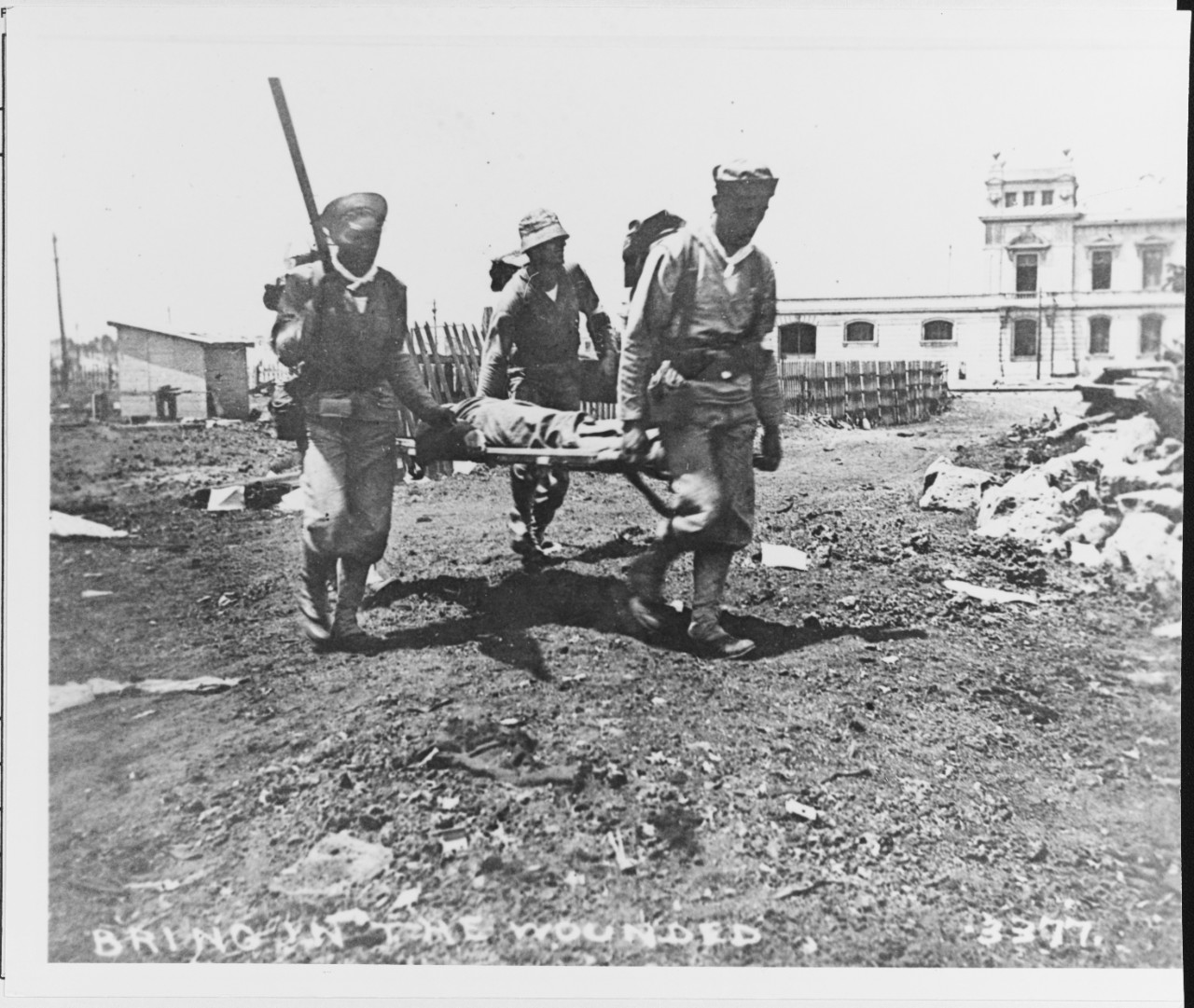 Sailors from USS FLORIDA serve as stretcher bearers in Veracruz, Mexico, in April 1914