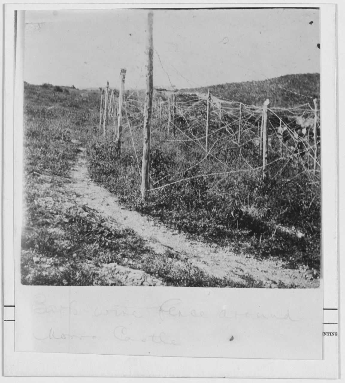 Barbed wire fence around Morro Castle. 1898