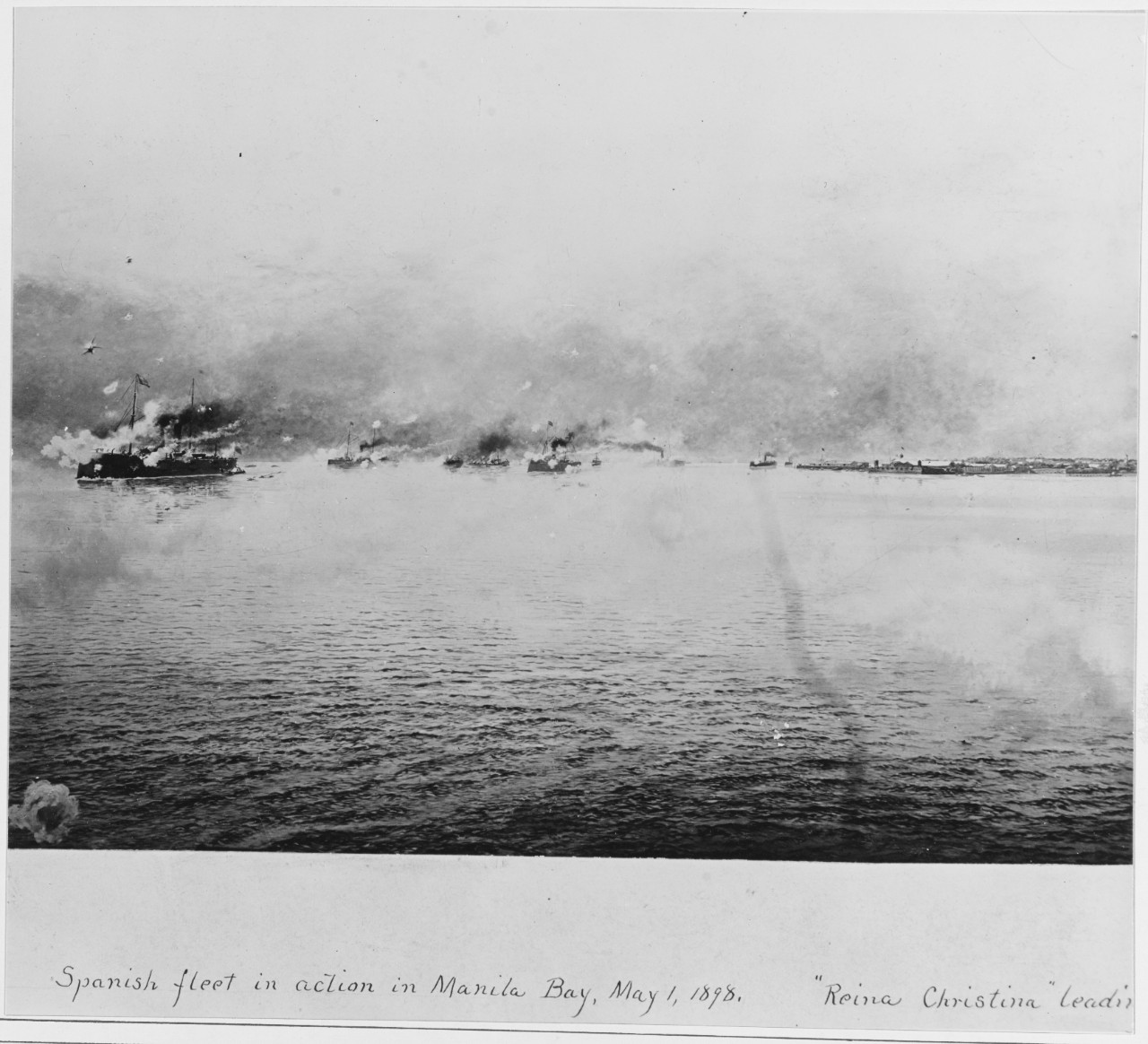 Spanish fleet in action in Manila Bay, May 1, 1898. REINA CHRISTINA