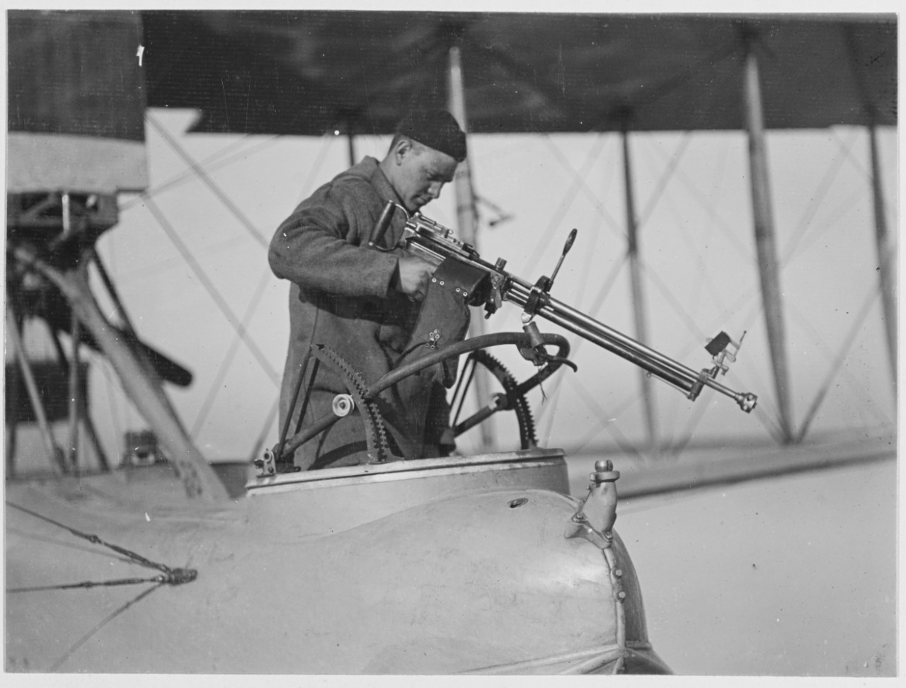 Preparing machine gun for gunnery prior to a flight. February 20, 1919