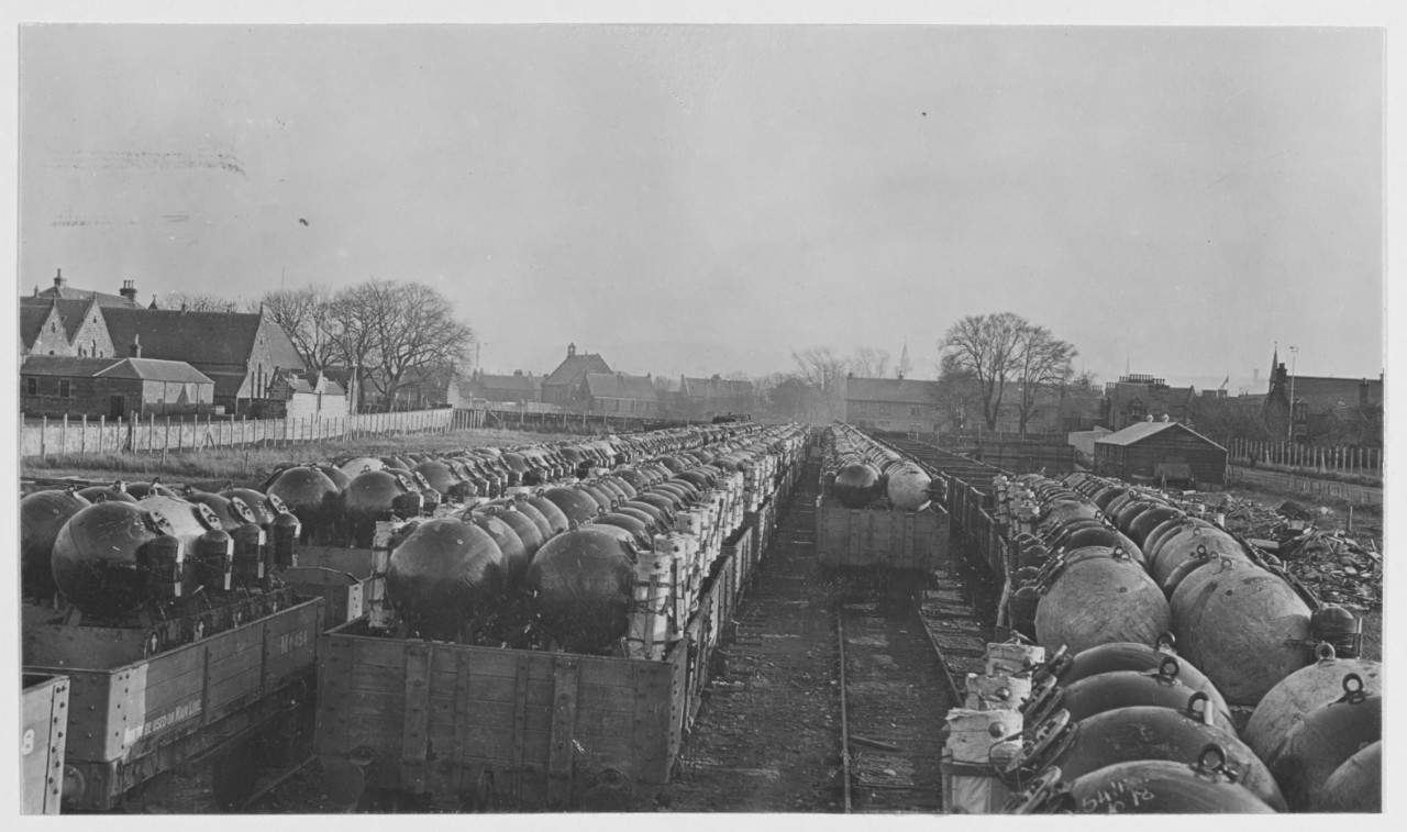 Assembled mines loaded for transfer, Navy Yards Foreign Base 18. Inverness, Scotland