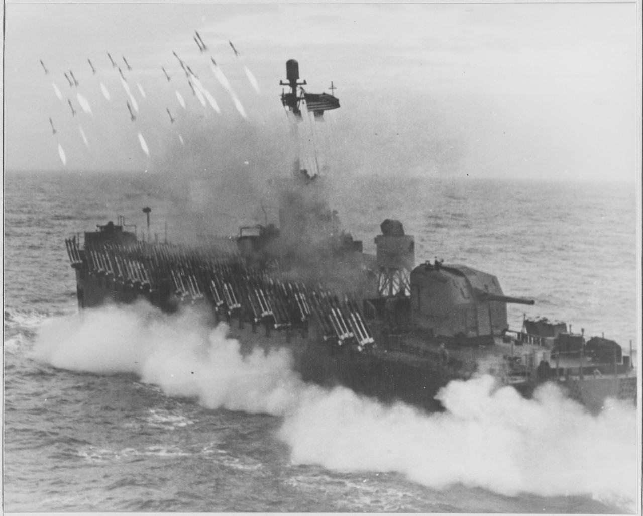 Rocket launching landing craft played an important part in blanketing enemy defenses during invasions. Rec'd. from All Hands January 1960