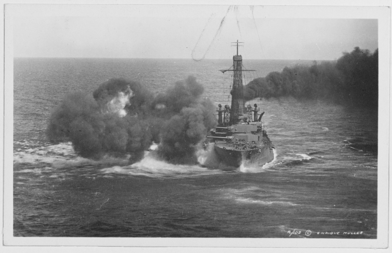 USS UTAH. Firing, the white patches are flamed and the black gases, she is firing 10, 12 inch guns. 1914