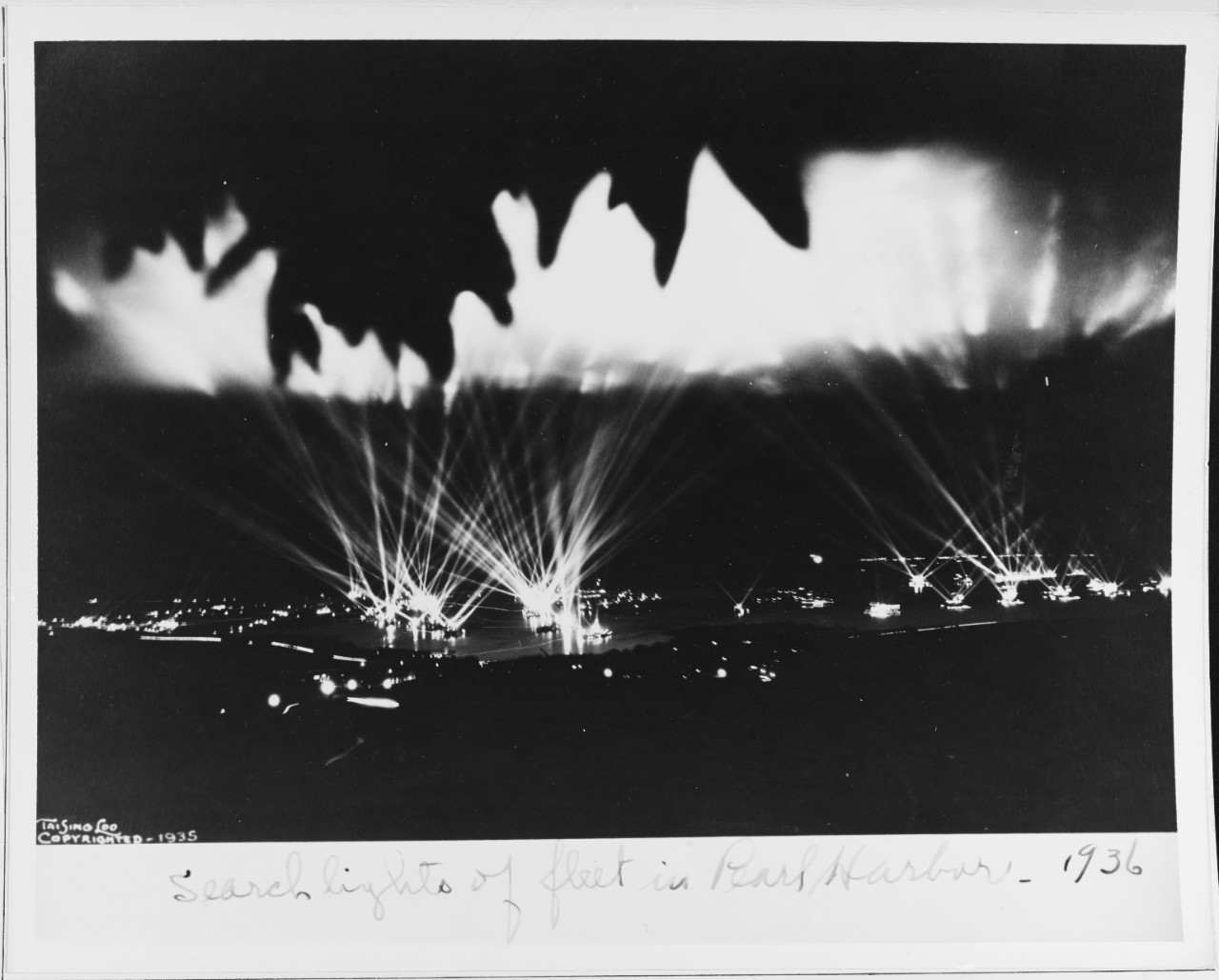Search lights of the Fleet in Pearl Harbor, 1936.