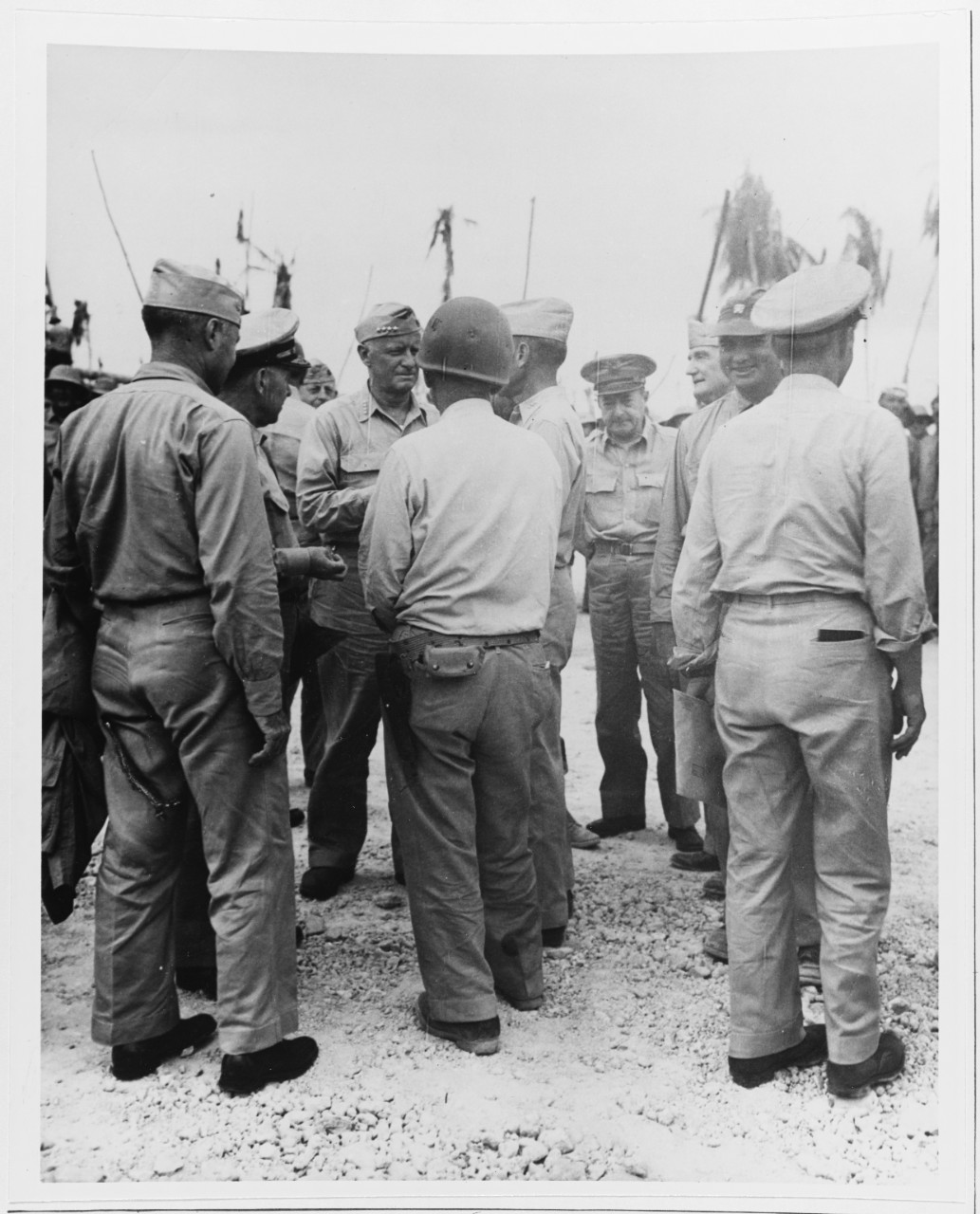 ADM C.W. Nimitz, Cincpac, and men inspect Betio island, 27 Nov. 1943