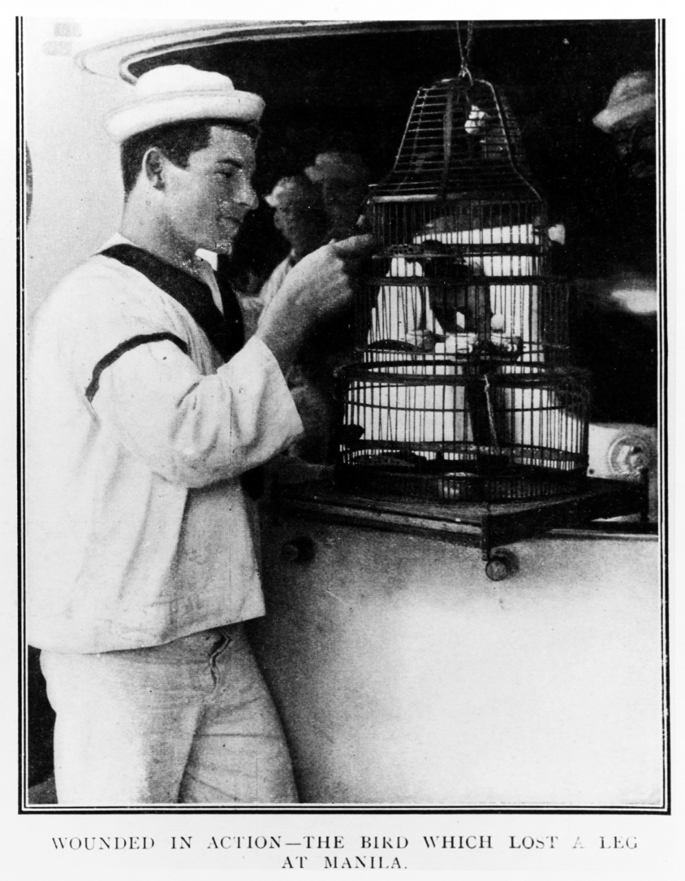 USS OLYMPIA (C-6), sailor with a parrot
