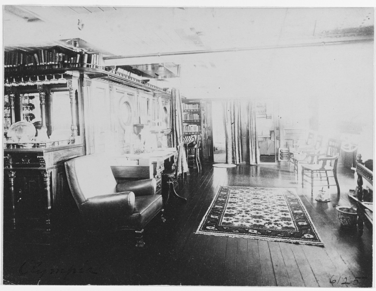USS OLYMPIA (C-6), view in the Captain's cabin, 1898. 