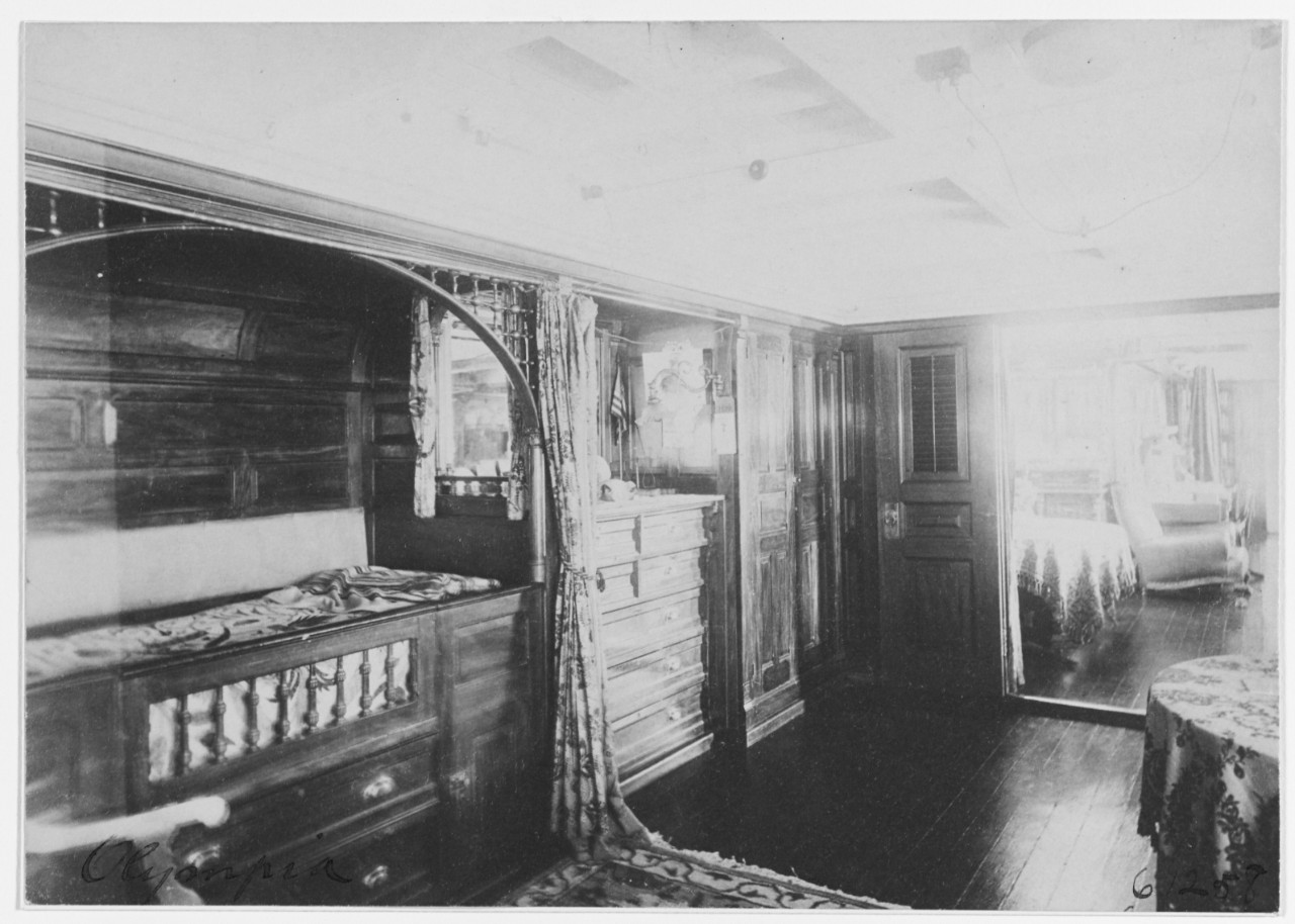 USS OLYMPIA (C-6), View in Admiral George Dewey's Cabin, showing bunk, 1898. 