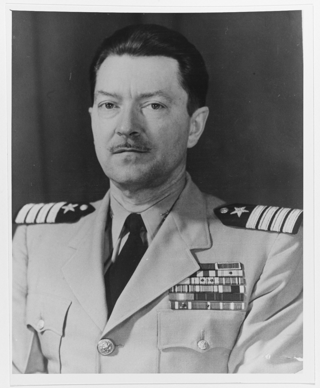 Captain Kemp Tolley, USN