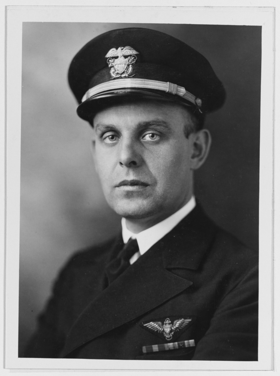Lieutenant Commander John E. Ostrander, Jr., USN