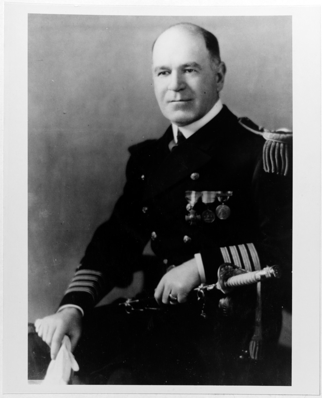 Captain J.R. Dexness, USN