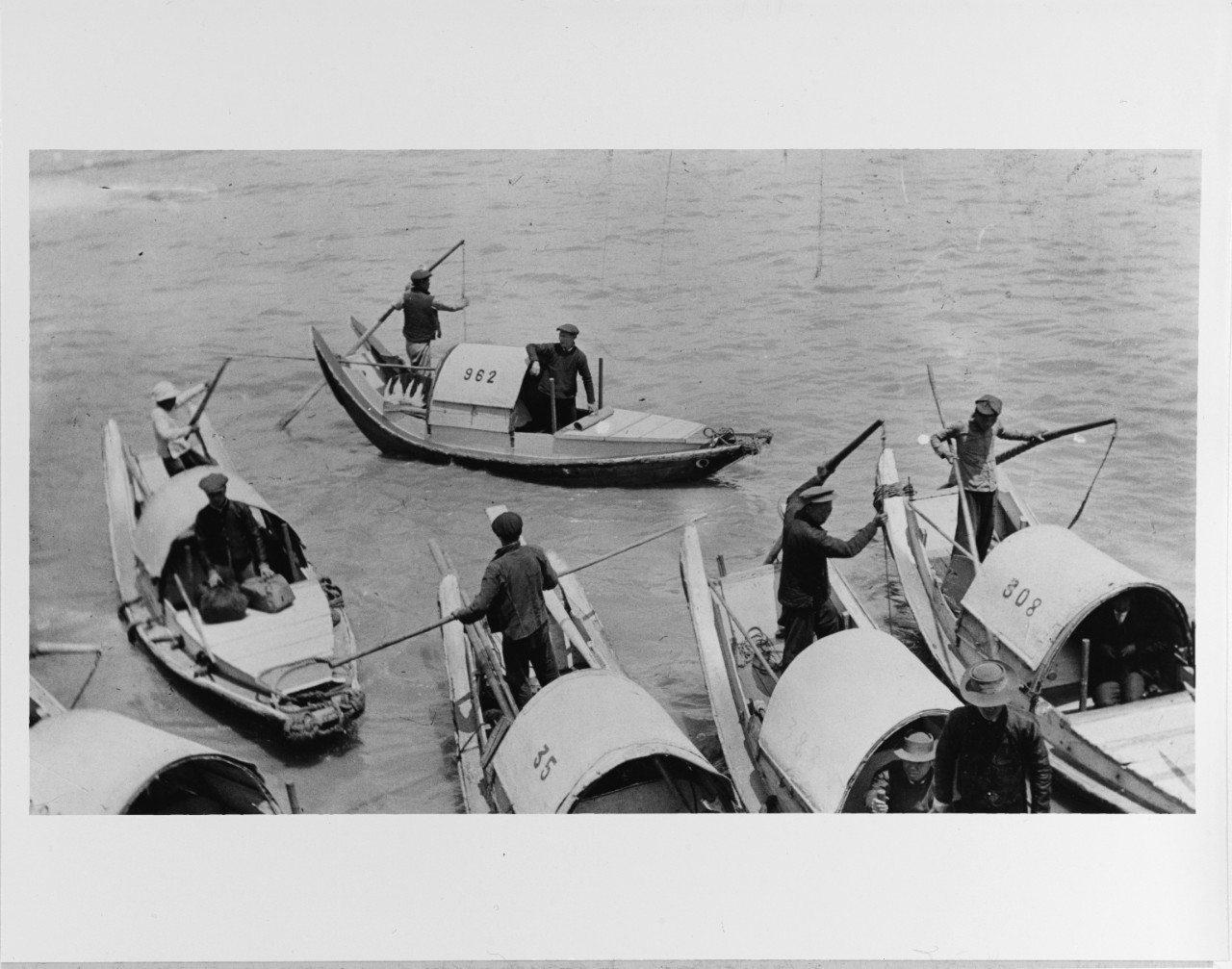 View of sampans in the Whangpoo River, Shanghai, China, circa 1912