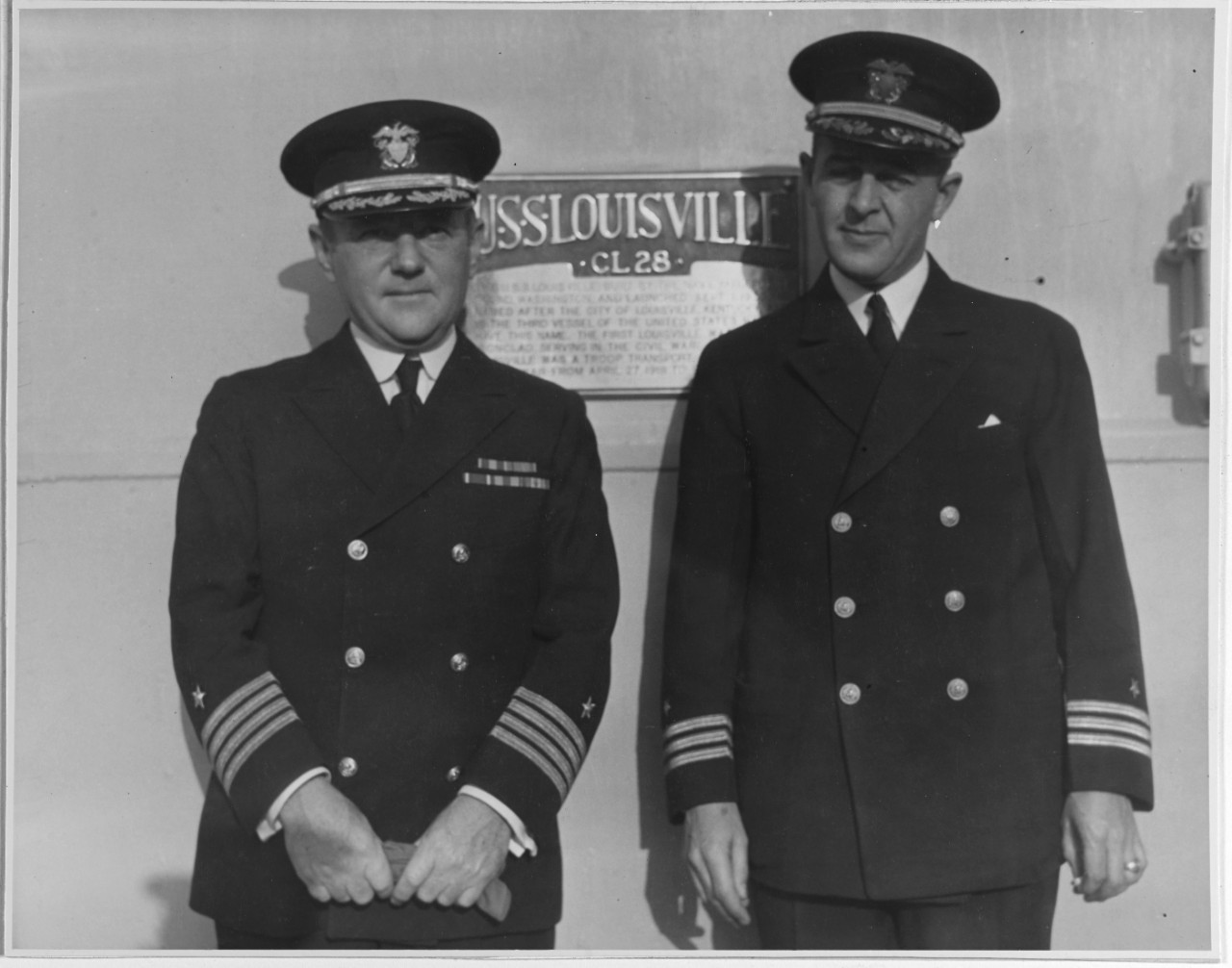 Captain E.J. Marquart, USN as commanding officer, USS LOUISVILLE (CL-28), with his executive officer, Commander L.G. Thebault, USN, 1932
