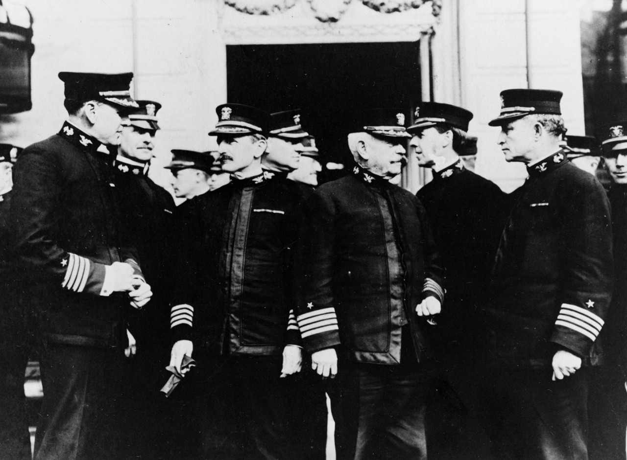 Captain J. R. Edie, USN; Captain R. H. Jackson, USN, Staff Representative; Captain Ashen C. Baker, USN; Captain George R. Evans, USN.