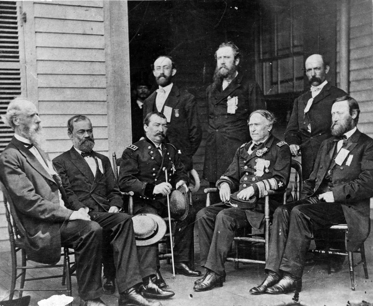 Admiral David G. Farragut (seated 4th from left) and General H. B. Sergeant (standing in center, rear)