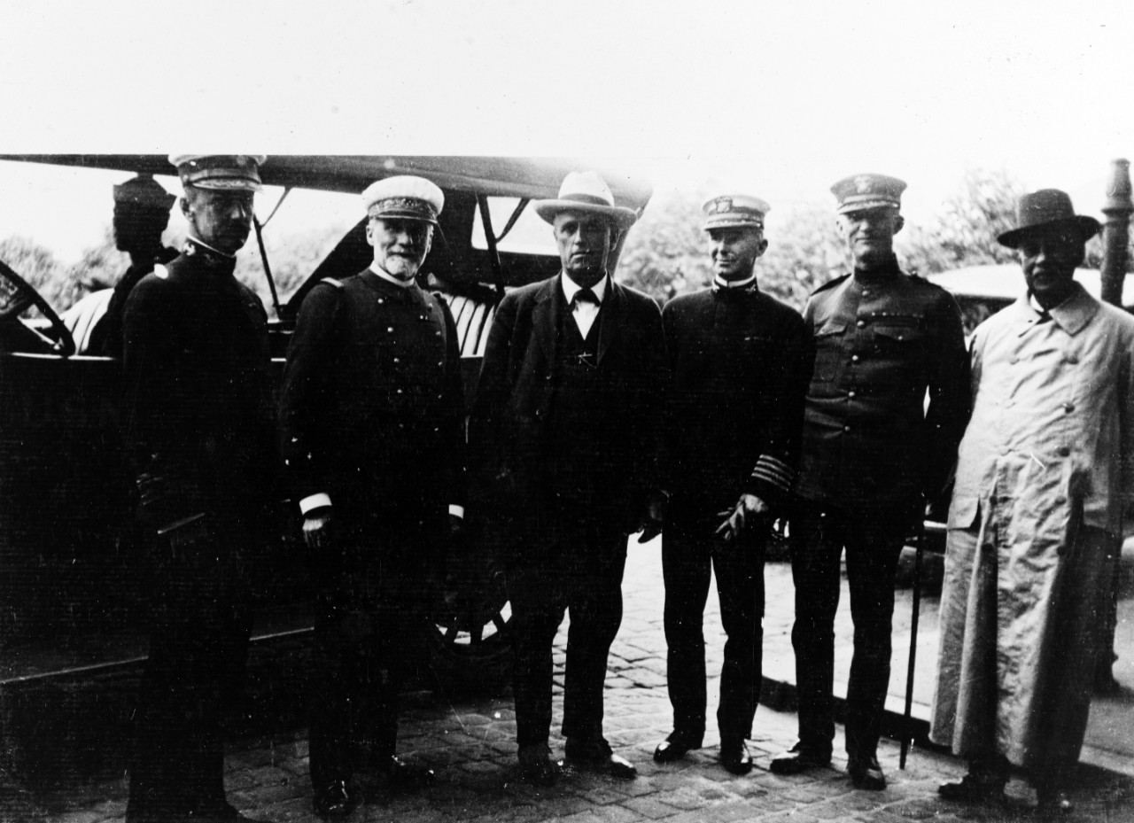 Congressmen and Naval Officers.
