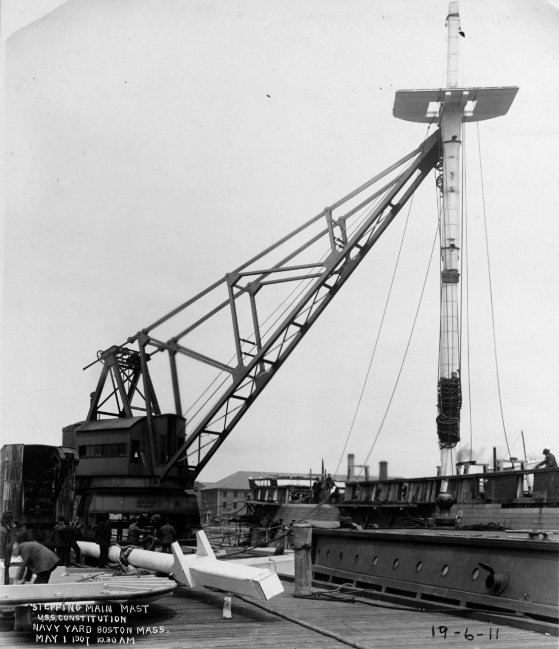 USS Constitution, stepping the mainmast, Boston Navy Yard, 1 May 1907.