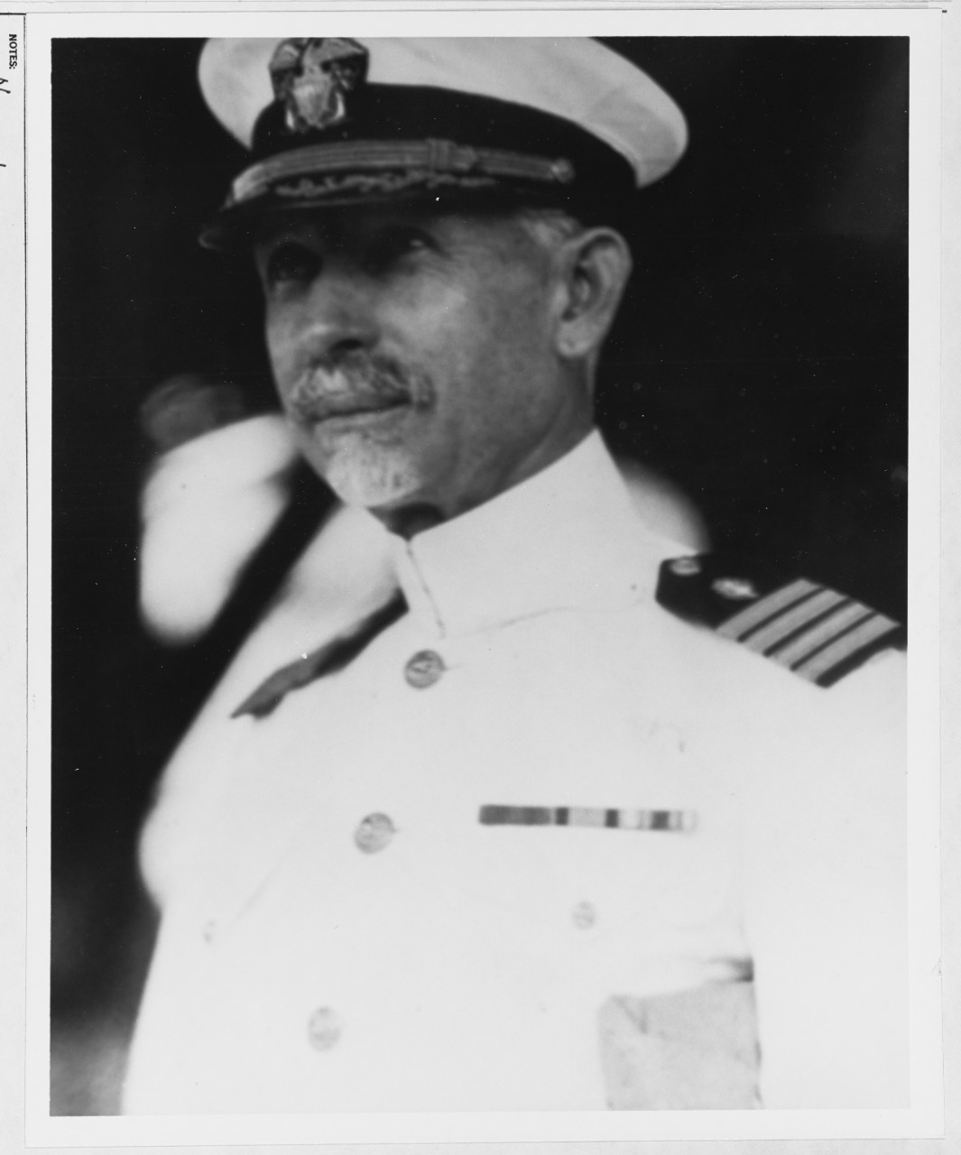 Captain Adrian R. Alfred, USN
